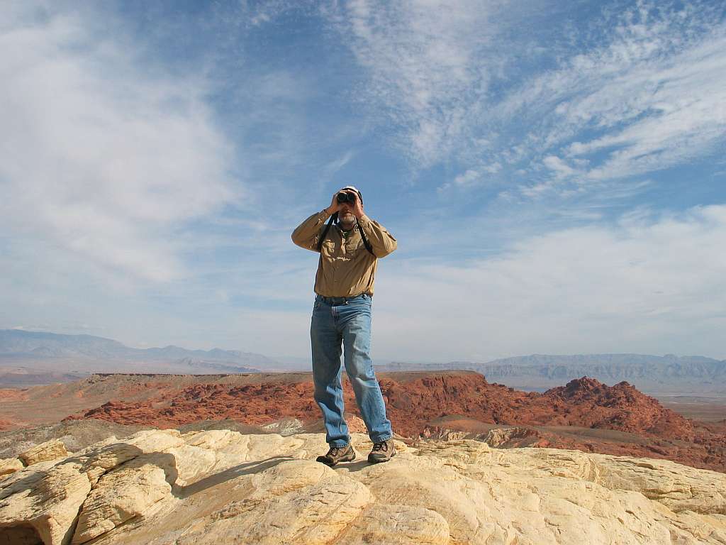 Don looking for birds on slickrock